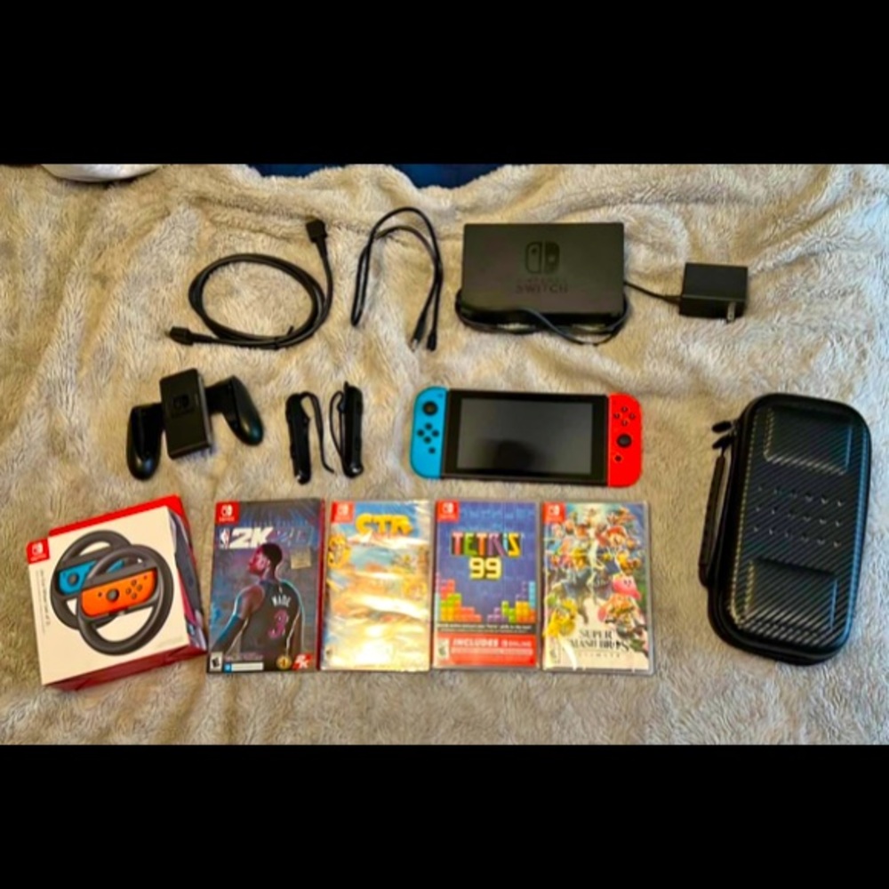 Nintendo Switch + Games + Joy-Con Wheel